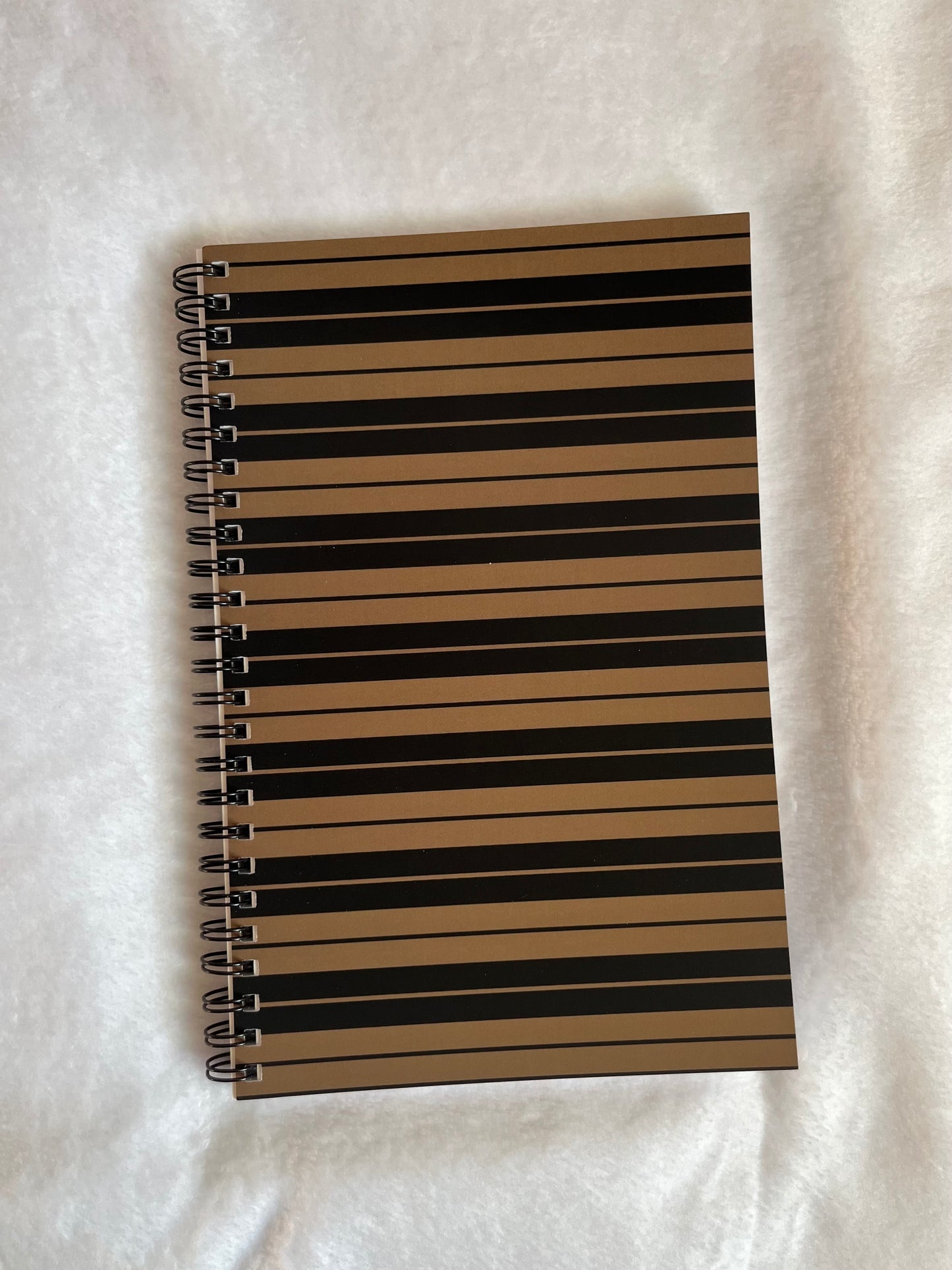 tan & black Charlie Brown stripe notebook